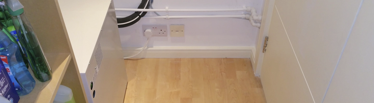 Internal Air Conditioning of Apartments in The Panoramic - water cooled condenser in the utility cupboard