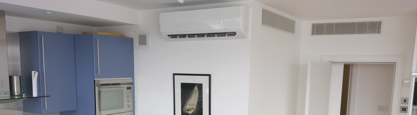 Internal Air Conditioning of Apartments in The Panoramic - whisper quiet high wall unit in open plan living area