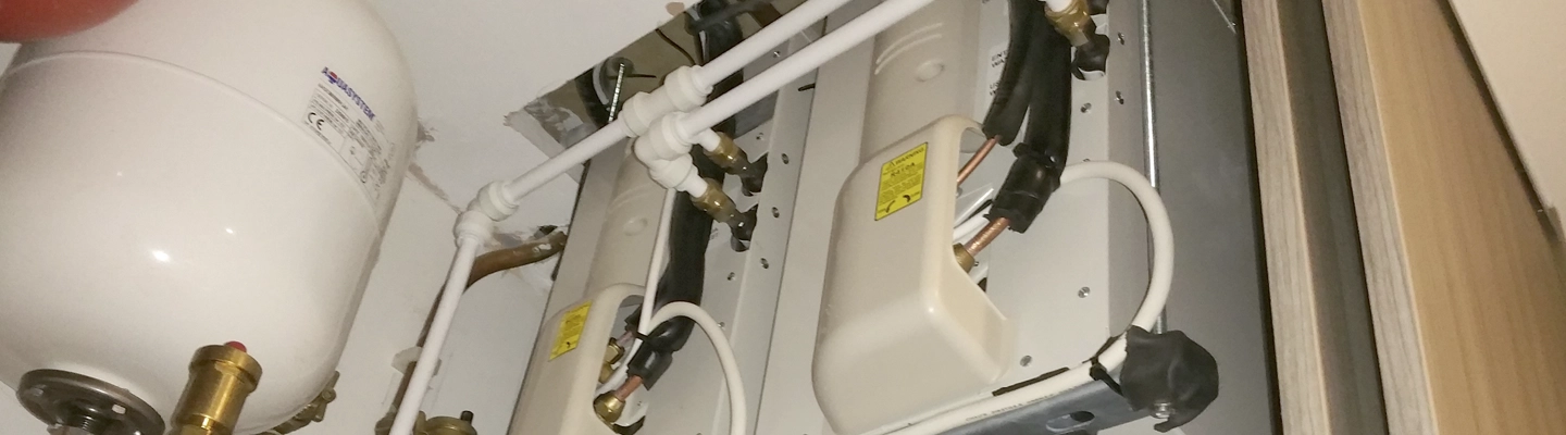 Installing internal AC to air condition an apartment in Fountain Court, Windsor in a conservation area - fully internal water cooled condensers