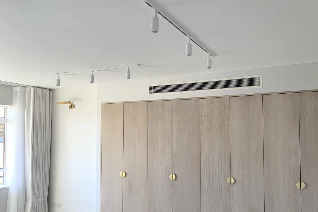 Air Conditioning For Houses In London - a ducted unit built into a wardrobe