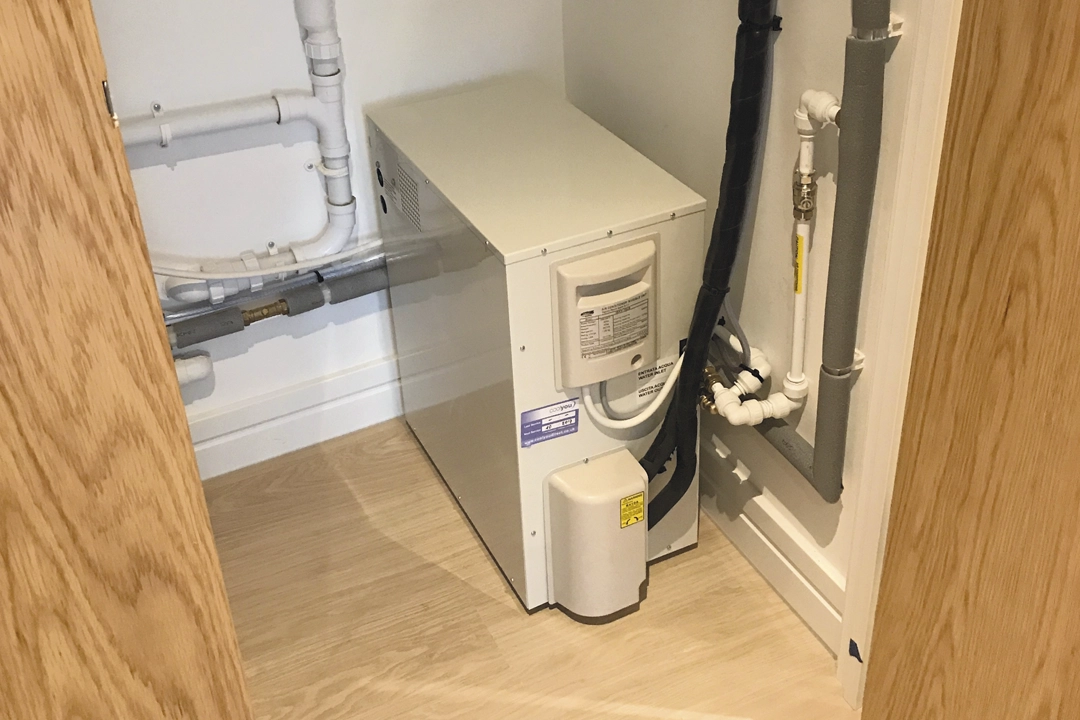 Cool You Water Cooled Air Conditioning - single condenser in a utility cupboard